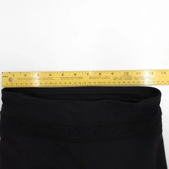 Lululemon Pants Womens 4 Black Crop Capri Mesh Lace Panel Zip Pocket Yoga Run - Picture 14 of 15